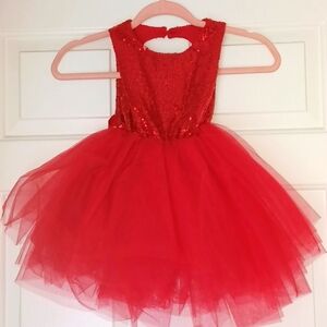 Sequin and tulle dress with heart shape back